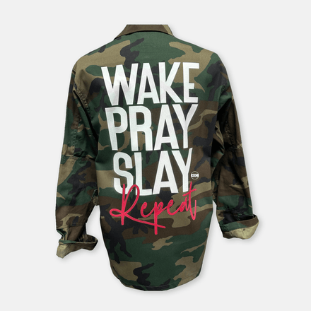 Stylish jacket featuring the empowering text 'Wake. Pray. Slay. Repeat.', symbolizing daily resilience and determination, by KIC NYC.